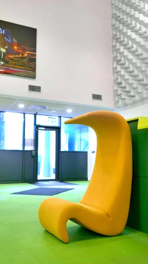 Sculptural yellow chair in the Club Lounge