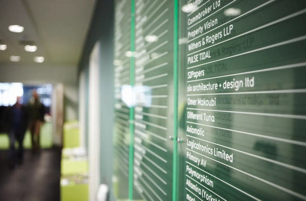 Glass tenant directory in the Club Lounge