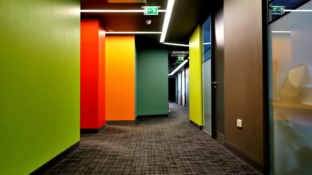 Colourful corridor with green, red, orange and yellow walls at Electric Works
