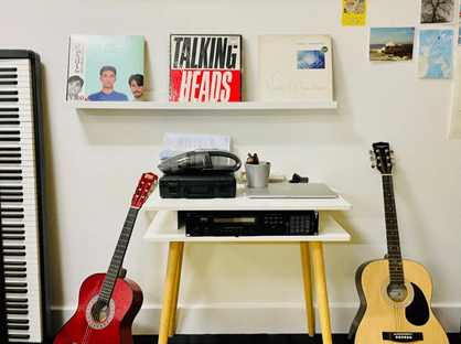 Guitars, a keyboard and records in the Link Learning office